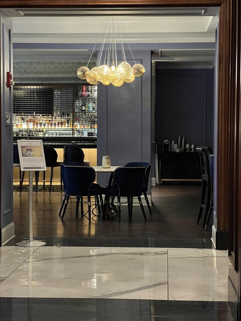 Lobby bar at the Read House hotel with bubble chandelier and blue velvet chairs